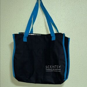 Scentsy Black Tote with Blue Trim zipper closure. Cool keeper inside lining.